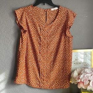Brown and cream leaf pattern pullover blouse
